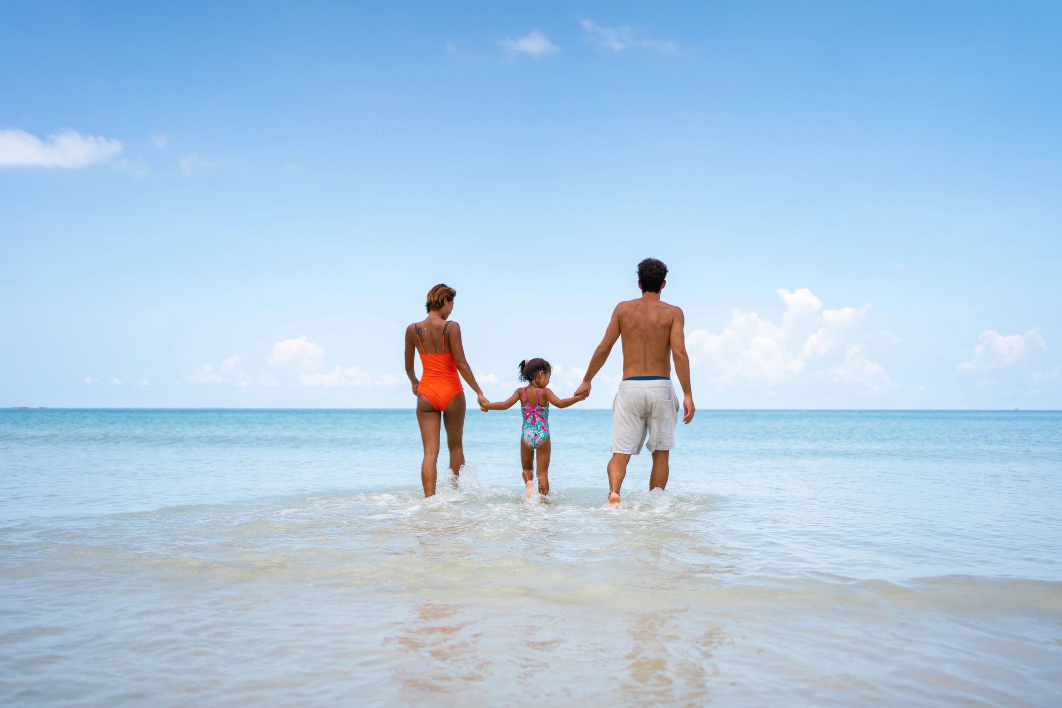 Family enjoying a beach vacation together